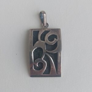 Artistic Silver and Black Pendant Necklace